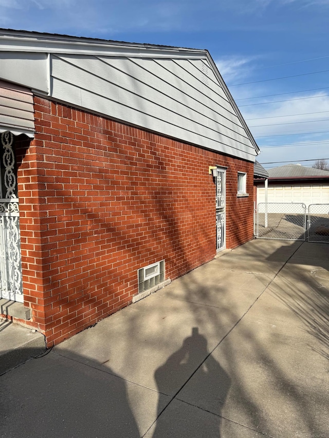 28724 Sutherland Dr, Warren, MI 48088 - view of side of property featuring brick siding