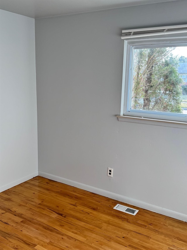 28724 Sutherland Dr, Warren, MI 48088 - spare room featuring baseboards and wood finished floors