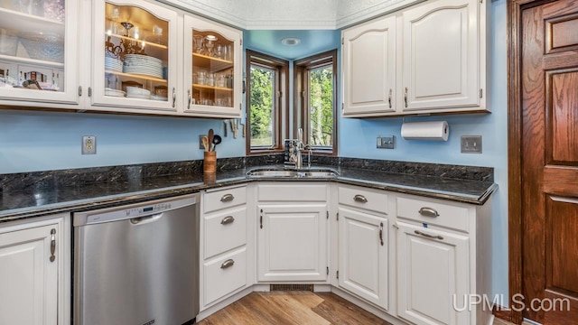 1128 E E St, Iron Mountain, MI 49801 - kitchen with dishwasher, a sink, white cabinets, and glass insert cabinets