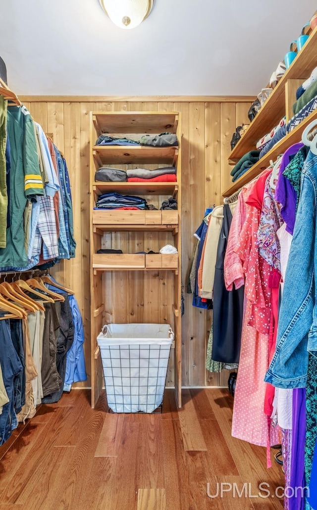 1128 E E St, Iron Mountain, MI 49801 - spacious closet featuring wood finished floors