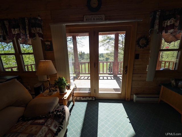 4537 Ii Rd, Garden, MI 49835 - entryway with baseboard heating and wooden walls