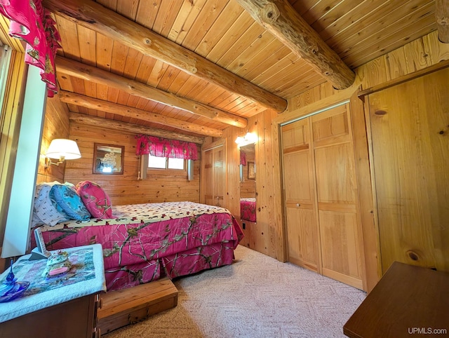 4537 Ii Rd, Garden, MI 49835 - carpeted bedroom with wood walls and wooden ceiling with exposed beams