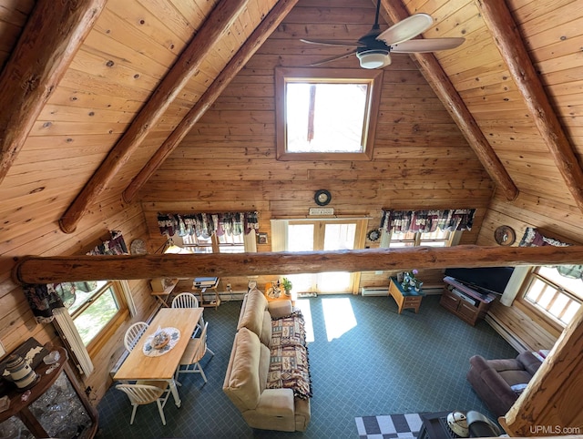 4537 Ii Rd, Garden, MI 49835 - living room with wood walls, wood ceiling, and ceiling fan