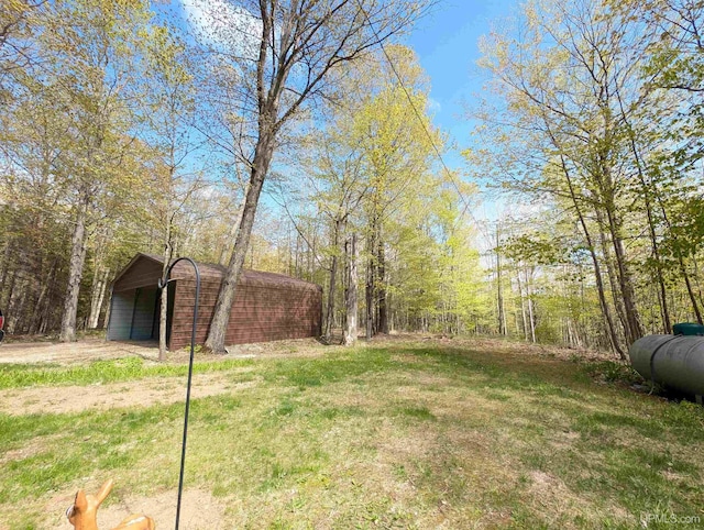 4537 Ii Rd, Garden, MI 49835 - view of grassy yard with a detached carport