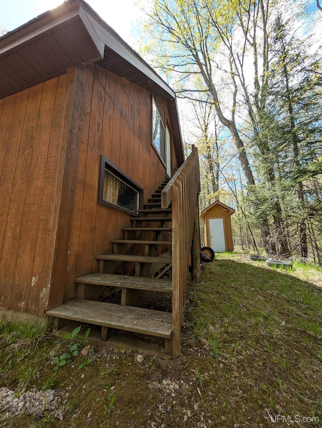 4537 Ii Rd, Garden, MI 49835 - view of side of property featuring stairs