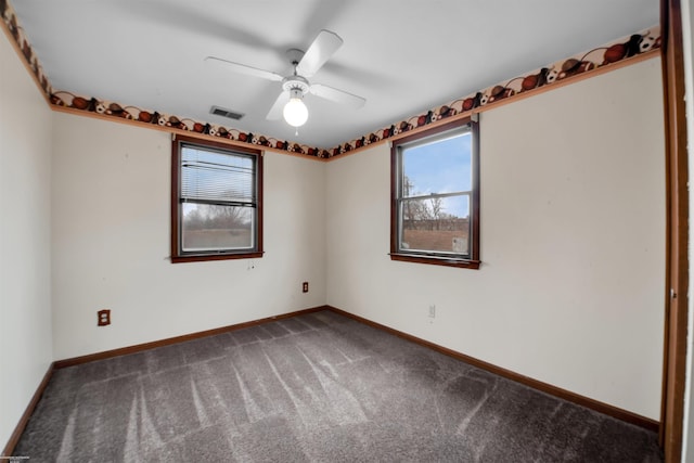 20681 Beaufait St, Harper Woods, MI 48225 - unfurnished room featuring carpet flooring, healthy amount of natural light, a ceiling fan, and baseboards