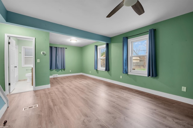 20681 Beaufait St, Harper Woods, MI 48225 - unfurnished room with a ceiling fan, light wood-style flooring, and baseboards