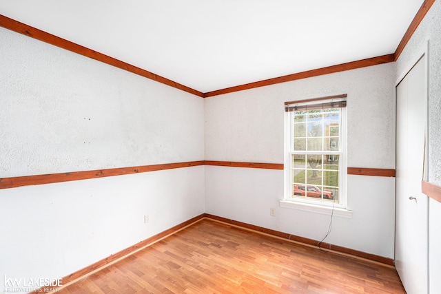 6019 Kingsfield Dr, West Bloomfield, MI 48322 - unfurnished room featuring light wood finished floors, baseboards, and ornamental molding