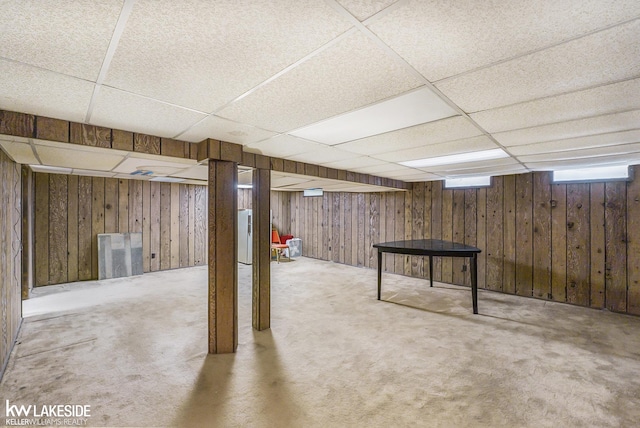 6019 Kingsfield Dr, West Bloomfield, MI 48322 - below grade area with a paneled ceiling, wood walls, and carpet floors