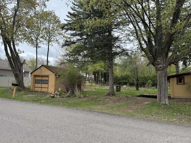 2003 Center St, Marquette, MI 49855 - view of front of house featuring an outdoor structure