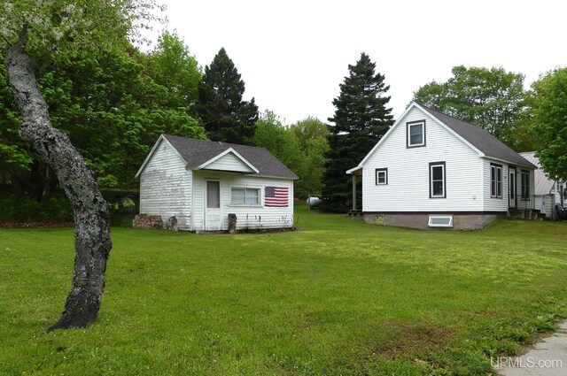 22019 E Everett Ave, Grand Marais, MI 49839 - view of front of property featuring a front yard