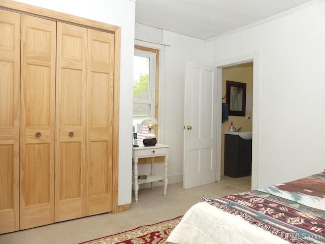 22019 E Everett Ave, Grand Marais, MI 49839 - bedroom featuring light colored carpet and a closet