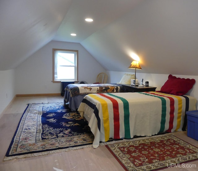 22019 E Everett Ave, Grand Marais, MI 49839 - bedroom featuring vaulted ceiling, recessed lighting, and baseboards