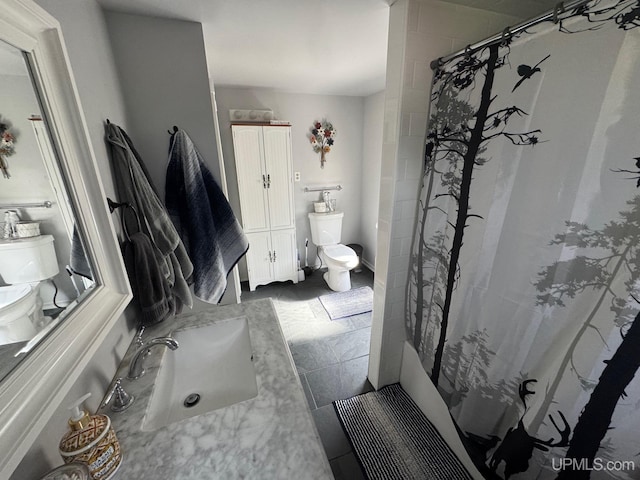 809 W A St, Iron Mountain, MI 49801 - bathroom with toilet, vanity, and a shower with shower curtain