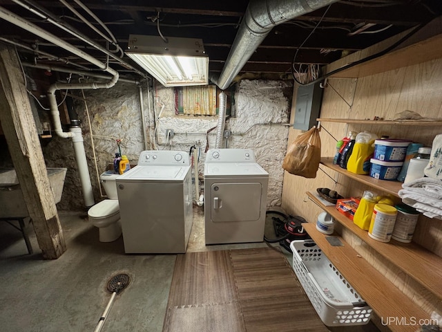 809 W A St, Iron Mountain, MI 49801 - laundry room featuring washer and dryer and electric panel