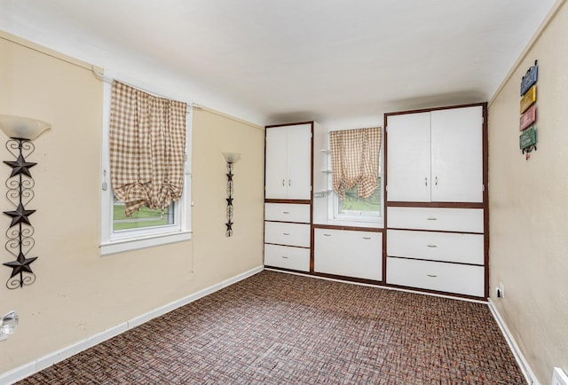 107 State Park Dr, Bay City, MI 48706 - unfurnished bedroom with carpet floors and baseboards