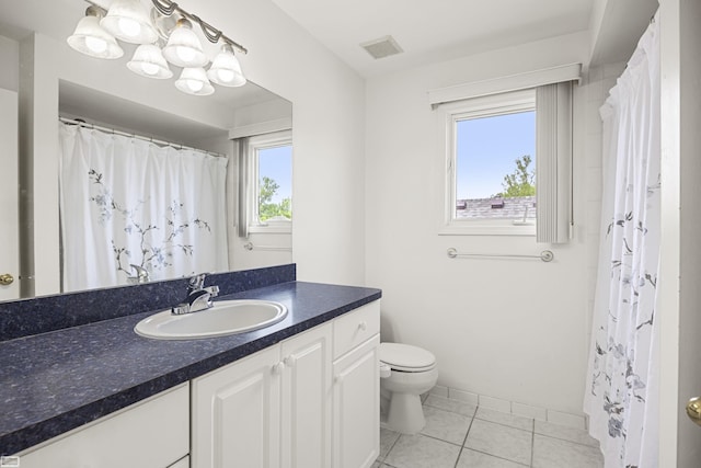 51461 Silver Bell Dr, Macomb Twp, MI 48042 - full bath with vanity, toilet, tile patterned flooring, baseboards, and curtained shower