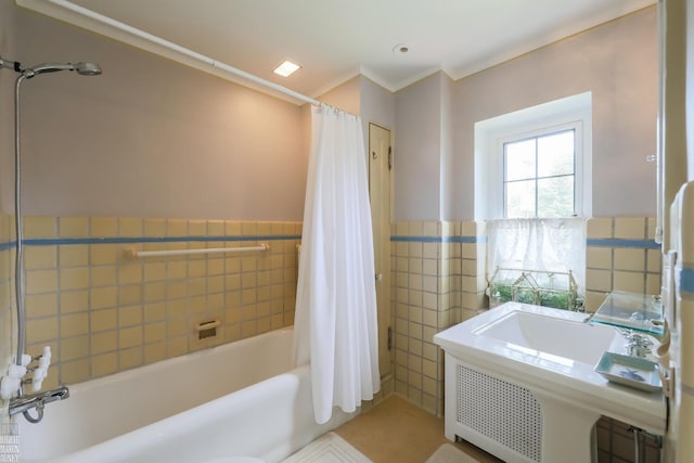 257 Ridge Rd, Grosse Pointe Farms, MI 48236 - bathroom with tile walls, shower / bath combination with curtain, wainscoting, and tile patterned flooring