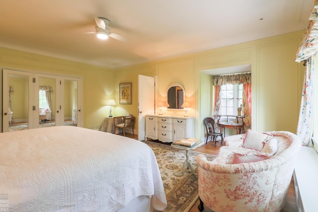 257 Ridge Rd, Grosse Pointe Farms, MI 48236 - bedroom with french doors, crown molding, and a ceiling fan