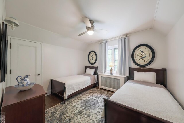 257 Ridge Rd, Grosse Pointe Farms, MI 48236 - bedroom featuring lofted ceiling, radiator heating unit, wood finished floors, ceiling fan, and baseboards