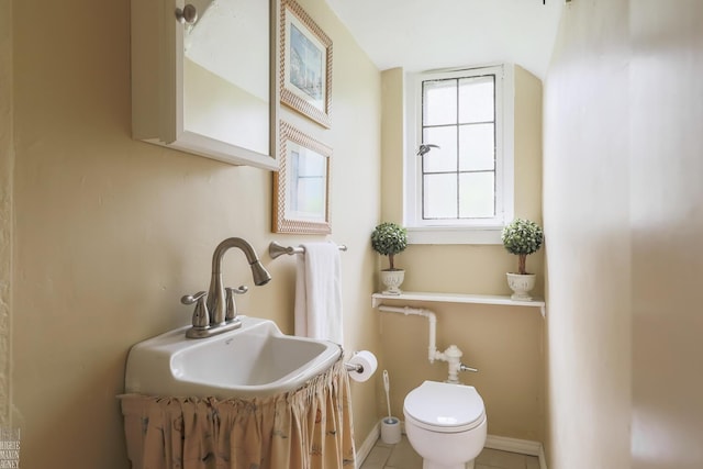 257 Ridge Rd, Grosse Pointe Farms, MI 48236 - bathroom featuring toilet, baseboards, tile patterned floors, and a sink