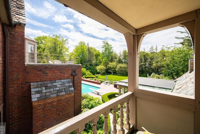 257 Ridge Rd, Grosse Pointe Farms, MI 48236 - balcony featuring view of pool area and view of wooded area