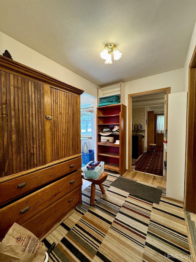 7848 Cole St, Rapid River, MI 49878 - interior space featuring a textured ceiling