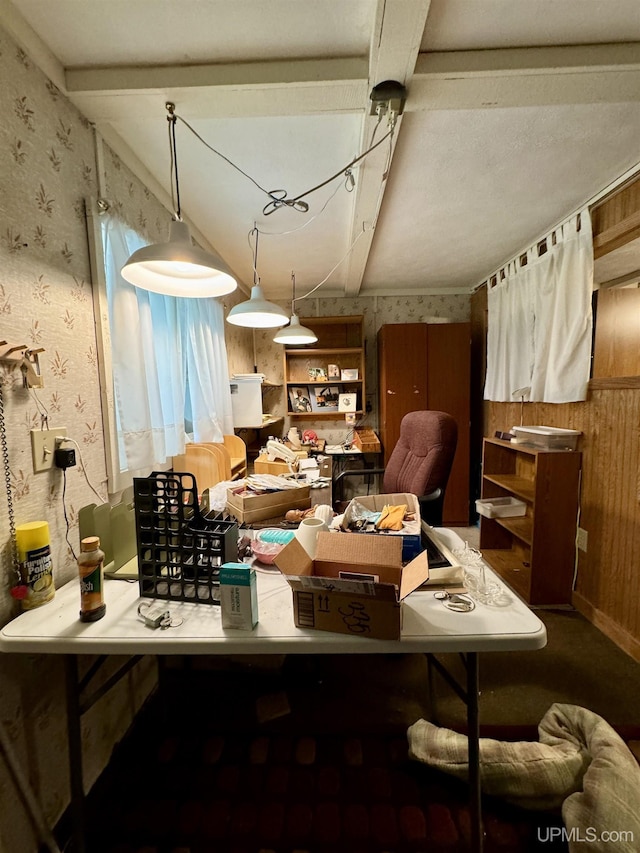7848 Cole St, Rapid River, MI 49878 - interior space with wallpapered walls, wooden walls, and beam ceiling