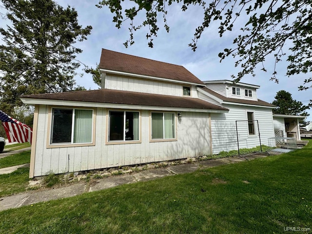 7848 Cole St, Rapid River, MI 49878 - view of property exterior with a yard