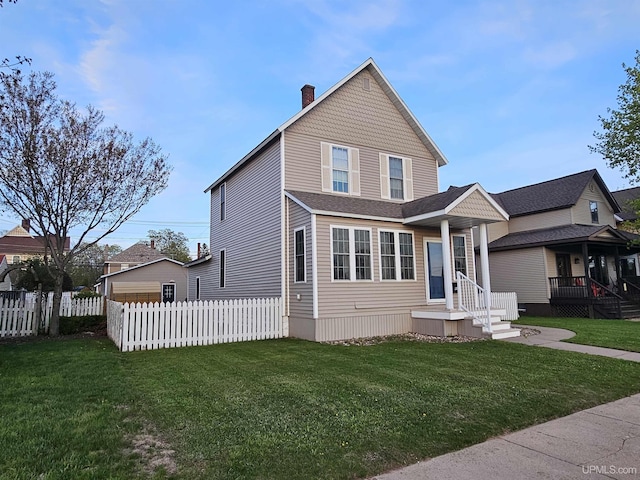 968 Baldwin Ave, Negaunee, MI 49866 - view of front facade featuring a chimney