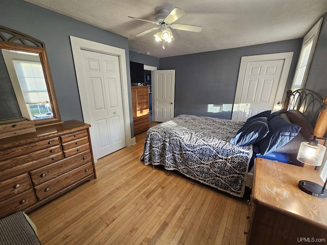 968 Baldwin Ave, Negaunee, MI 49866 - bedroom with light wood-style flooring, a closet, and ceiling fan