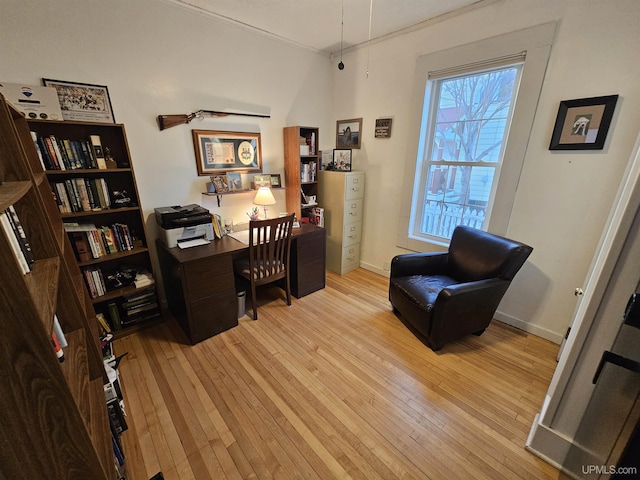 968 Baldwin Ave, Negaunee, MI 49866 - office area with wood-type flooring and baseboards