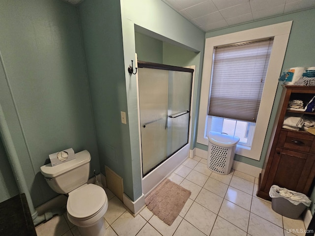 968 Baldwin Ave, Negaunee, MI 49866 - bathroom featuring toilet, baseboards, and tile patterned floors
