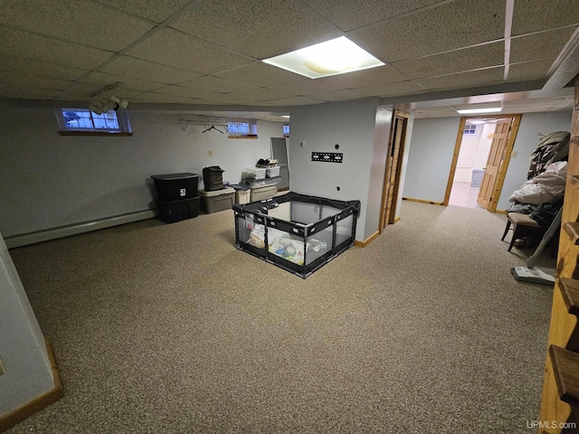 968 Baldwin Ave, Negaunee, MI 49866 - basement with a drop ceiling, carpet floors, and a baseboard radiator