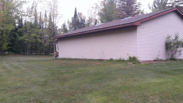 4158 Scott Ct, Gladwin, MI 48624 - view of property exterior featuring a lawn