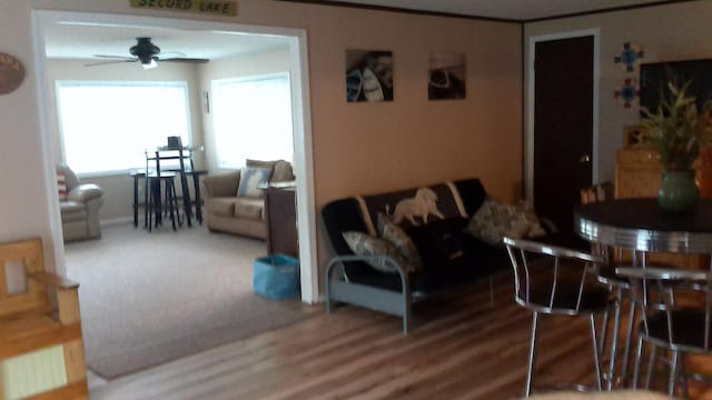 4158 Scott Ct, Gladwin, MI 48624 - dining space with a ceiling fan and wood finished floors