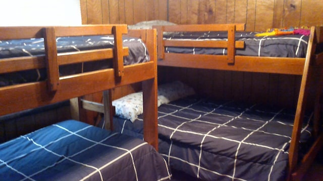 4158 Scott Ct, Gladwin, MI 48624 - carpeted bedroom with wooden walls