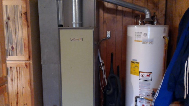 4158 Scott Ct, Gladwin, MI 48624 - utility room featuring water heater