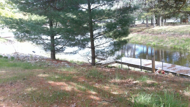 4158 Scott Ct, Gladwin, MI 48624 - dock area featuring a water view