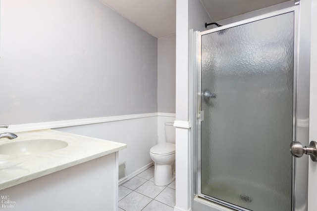656 Lawson Dr, Lake Orion, MI 48362 - full bath featuring a shower stall, tile patterned floors, vanity, and toilet