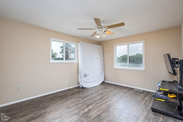 656 Lawson Dr, Lake Orion, MI 48362 - workout area with wood finished floors, baseboards, and ceiling fan