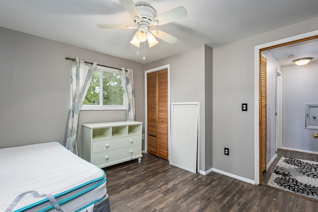656 Lawson Dr, Lake Orion, MI 48362 - bedroom featuring a closet, wood finished floors, baseboards, and a ceiling fan