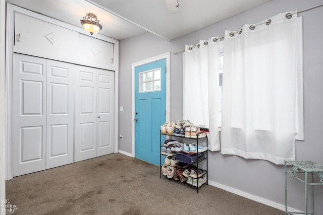 656 Lawson Dr, Lake Orion, MI 48362 - foyer entrance with carpet and baseboards