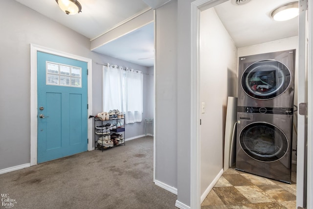 656 Lawson Dr, Lake Orion, MI 48362 - laundry area with stacked washing machine and dryer, healthy amount of natural light, baseboards, and carpet floors