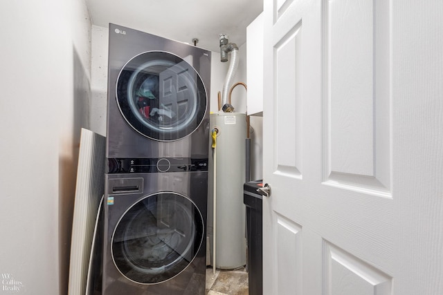 656 Lawson Dr, Lake Orion, MI 48362 - laundry area featuring stacked washer / dryer and water heater