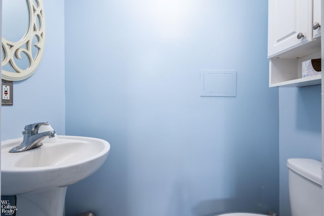 656 Lawson Dr, Lake Orion, MI 48362 - bathroom with toilet and a sink