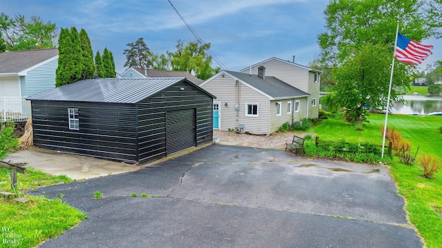 656 Lawson Dr, Lake Orion, MI 48362 - view of front of property featuring an outdoor structure