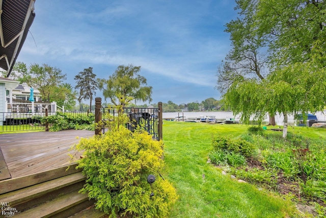 656 Lawson Dr, Lake Orion, MI 48362 - view of yard featuring a deck with water view