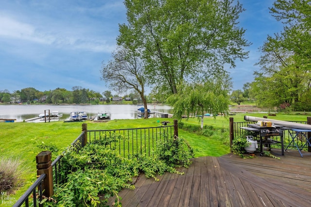 656 Lawson Dr, Lake Orion, MI 48362 - wooden terrace with a water view and a lawn