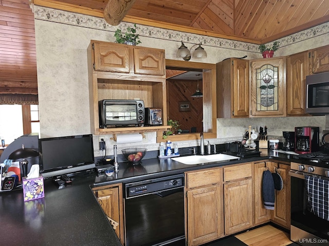 2051 Town Rd M Rd, Florence T-Wi, WI 54121 - kitchen featuring stainless steel appliances, a sink, wooden ceiling, dark countertops, and brown cabinets